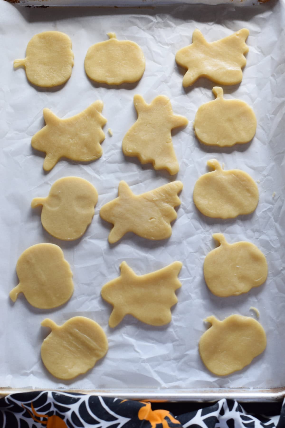 Unbaked cookies on a baking tray.